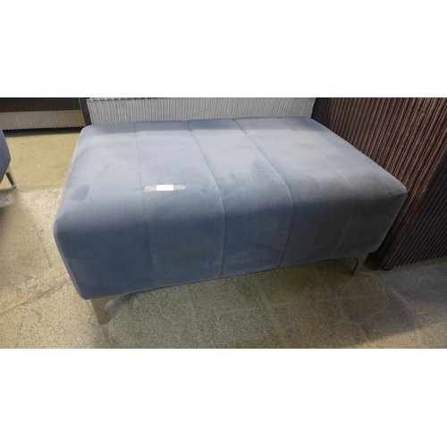 1456 - A blue/grey velvet upholstered footstool on chrome legs