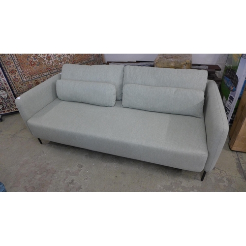 1403 - An olive upholstered three seater sofa