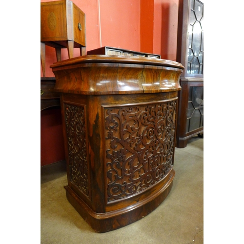 165 - An early Victorian rosewood fretwork Davenport desk, manufactured by J. Manuel, Sheffield