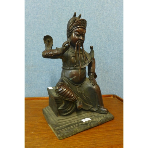 369 - A Chinese bronze figure of an Emperor