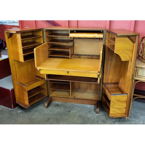 69 - A teak home office cabinet