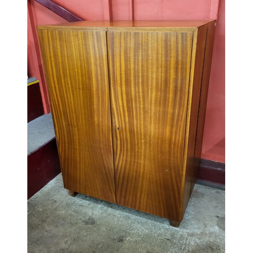 69 - A teak home office cabinet