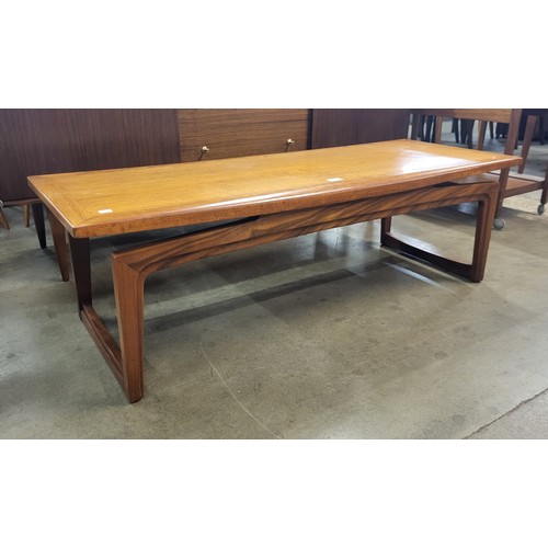 82 - A Remploy teak coffee table