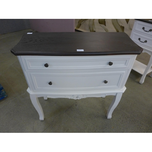 1611 - A white three drawer chest with contrast top