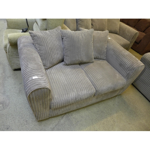 1617 - An ash jumbo cord three seater, two seater and 1.5 seater sofas