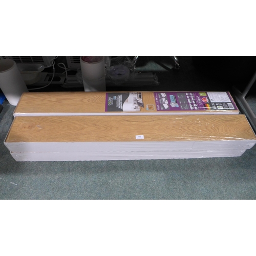 3249 - 4 packs of Toasted Honey Laminate Flooring (278-40-43) * This lot is subject to VAT