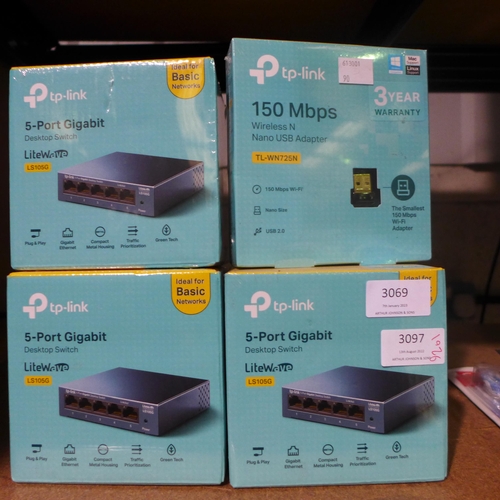 3069 - 3 x 5 port gigabit desktop switches  and a 150 mbps wireless adapter (262-43)  * This lot is subject... 