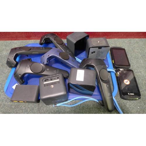 3124 - Four HTC VR Sensors and 4 Vive VR Controllors * This lot is subject to vat