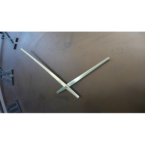 1394 - A large metal station clock