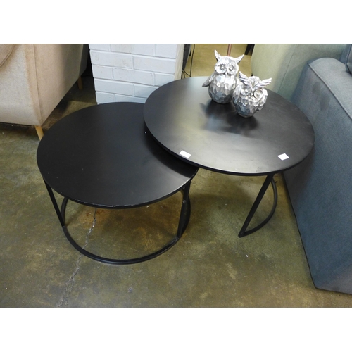 1446 - A black circular nest of two tables