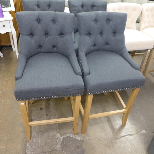 1494 - A pair of Bradley dark grey upholstered button back bar stools