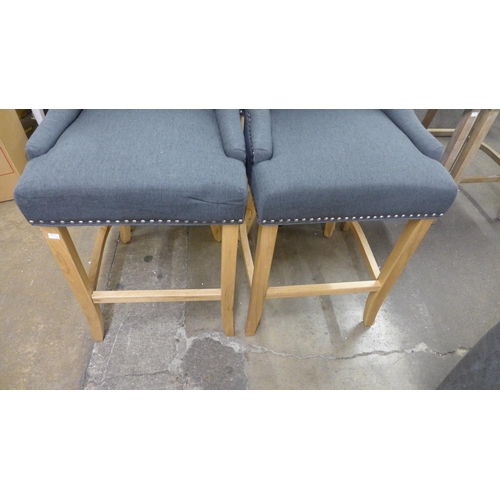 1494 - A pair of Bradley dark grey upholstered button back bar stools