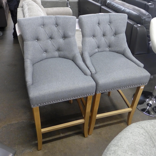 1501 - A pair of Bradley light grey upholstered button back bar stools