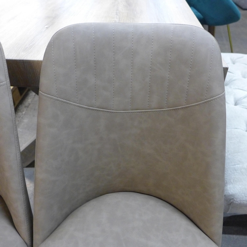 1511 - A pair of Jaden elk upholstered dining chairs