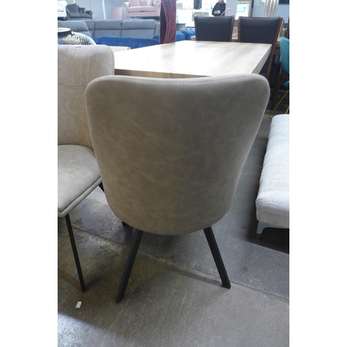 1511 - A pair of Jaden elk upholstered dining chairs