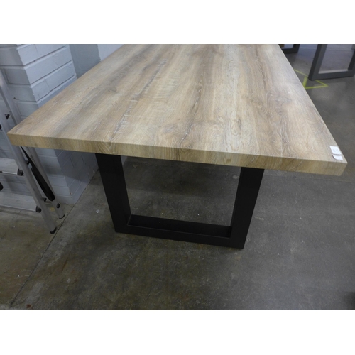 1514 - A Burton 1.8m oak effect dining table, damaged