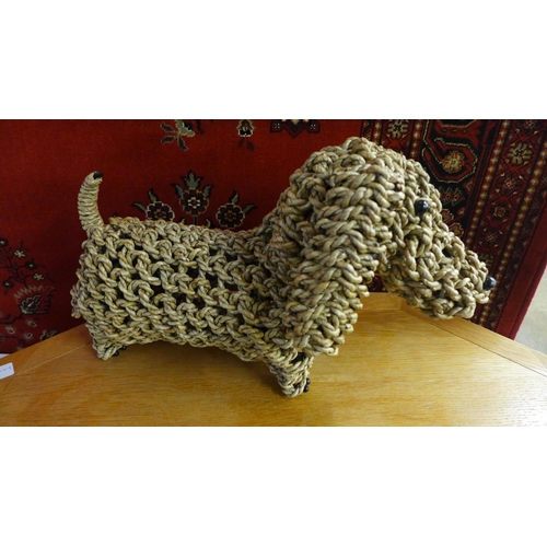 1518 - A standing hand made seagrass sausage dog, H 27cms (ACC09523)   #