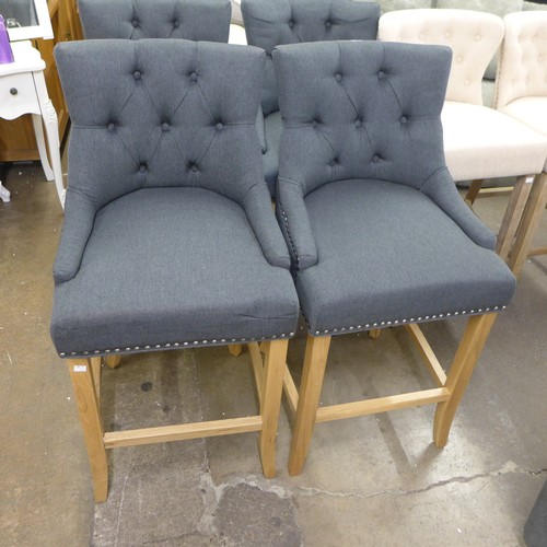 1495 - A pair of Bradley dark grey upholstered button back bar stools