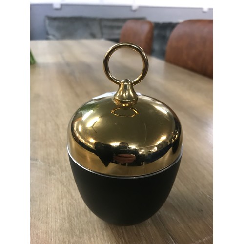 1312 - A small black and gold pot