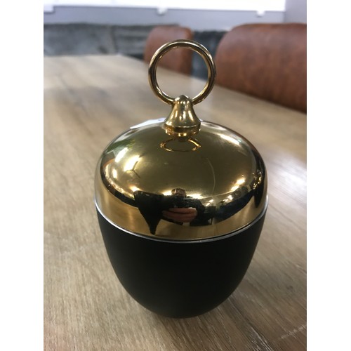 1313 - A small black and gold pot