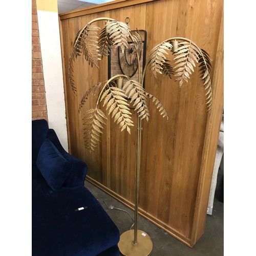 1384 - A gold floor standing palm tree lamp