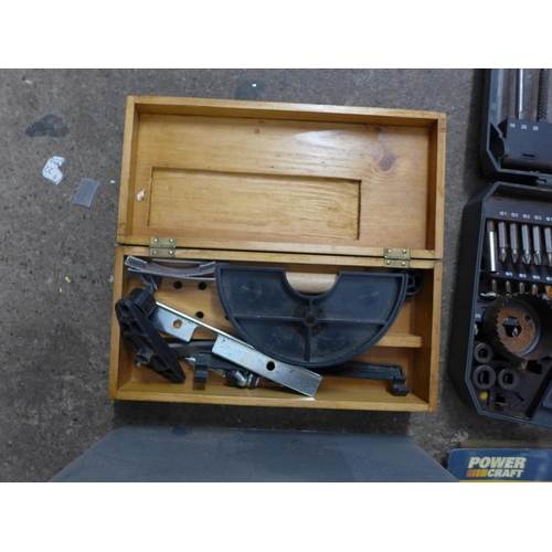 2027 - Box with table saw, blades, helmet, drill bits, rawl plugs and cutting discs