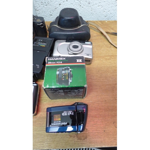 2166 - Blue holdall with assorted cameras and accessories