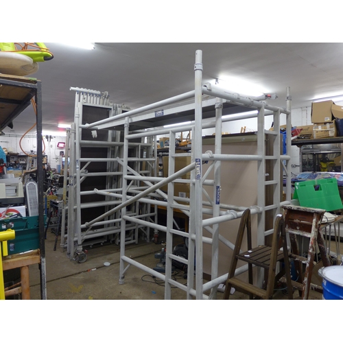 2340 - Lewis approx 20ft aluminium scaffold tower with support poles, 3 work platforms and 6 side sections