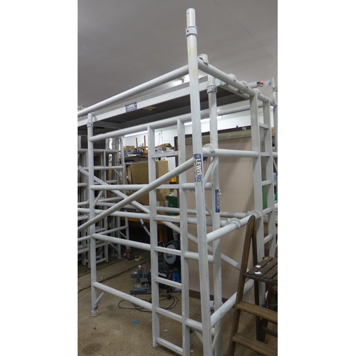 2340 - Lewis approx 20ft aluminium scaffold tower with support poles, 3 work platforms and 6 side sections