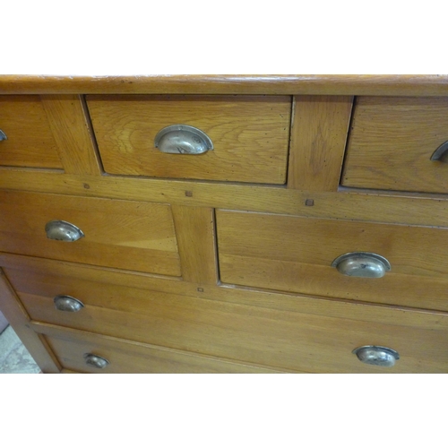 1563 - A Waring and Gillow oak dressing chest