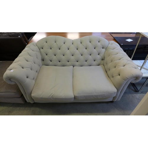 1568 - A Joules grey three seater Chesterfield style sofa