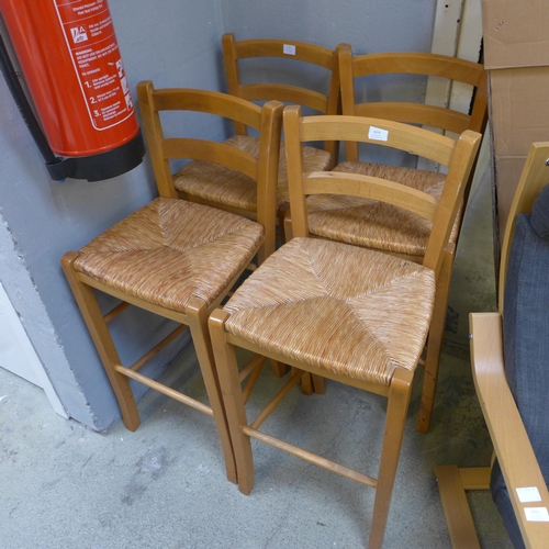 1614 - A set of four wicker and oak bar stools