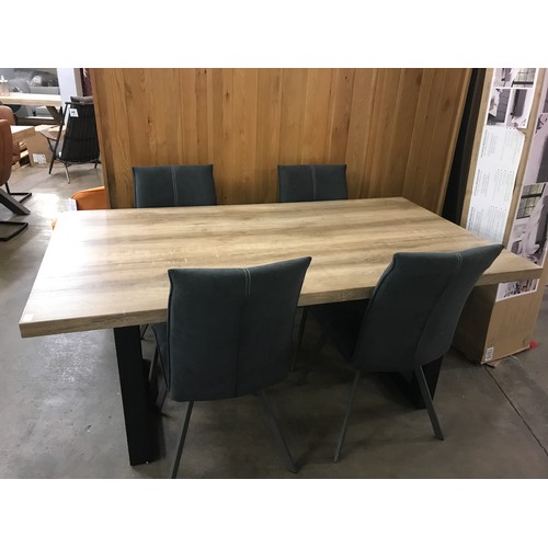 1504 - A Burton 1.8m oak effect dining table with a set of four Tamar charcoal upholstered dining chairs