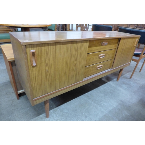 106 - A simulated teak sideboard