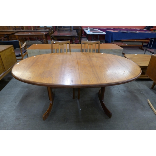 107 - A G-Plan Fresco teak extending dining table and six chairs