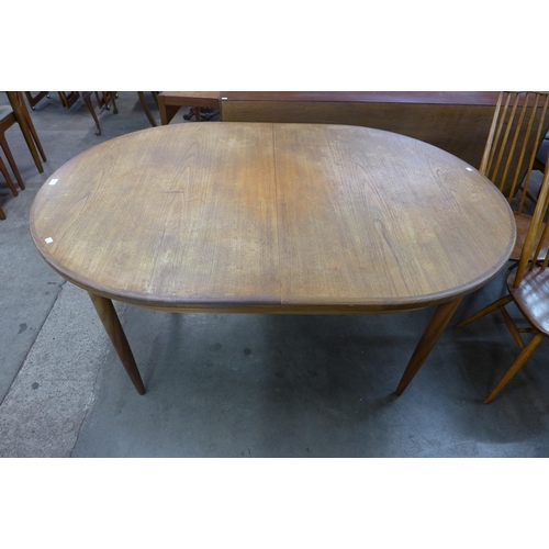 114 - A G-Plan Fresco teak extending dining table