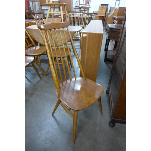 116 - A set of four Ercol elm and beech Goldsmith chairs