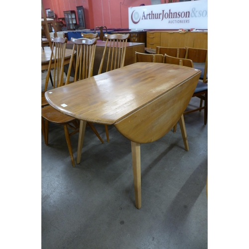 118 - An Ercol Blonde elm and beech Windsor drop-leaf table