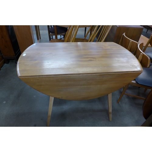 118 - An Ercol Blonde elm and beech Windsor drop-leaf table