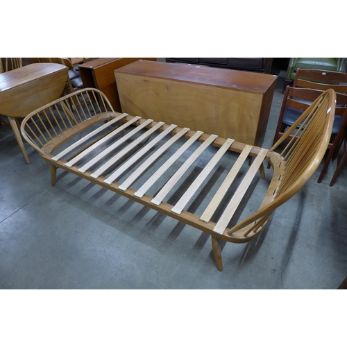 119 - An Ercol Blonde beech single day bed