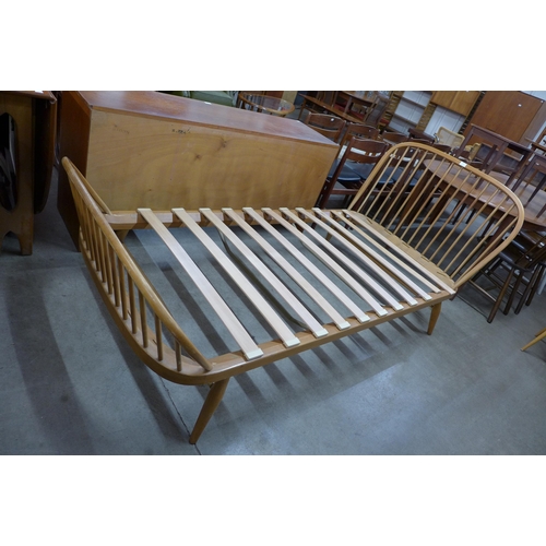 119 - An Ercol Blonde beech single day bed