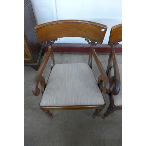 143 - A pair of William IV mahogany library chairs