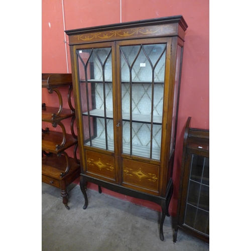 152 - An Edward VII inlaid mahogany display cabinet