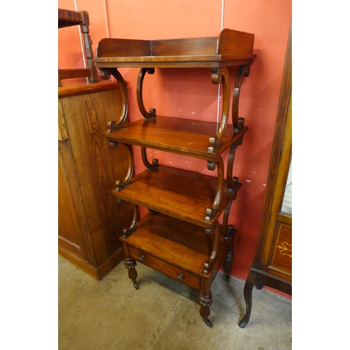 153 - An early Victorian mahogany four tier whatnot