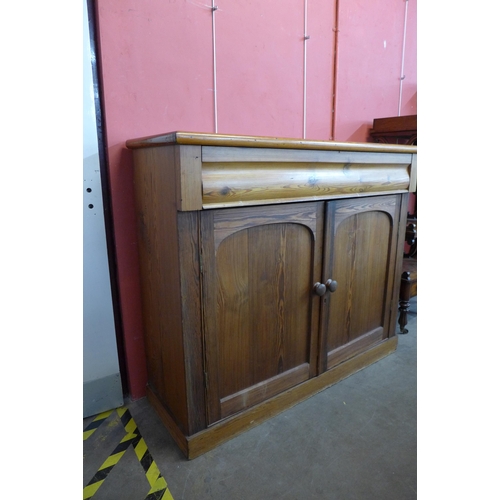 155 - A Victorian pitch pine two door kitchen cupboard