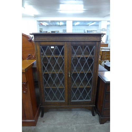 162 - An oak two door bookcase