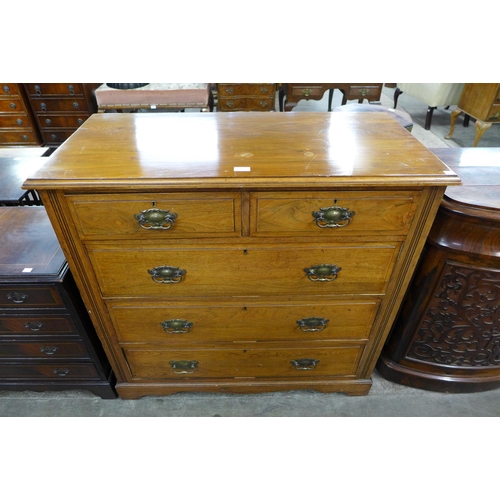 164 - A late Victorian walnut chest of drawers