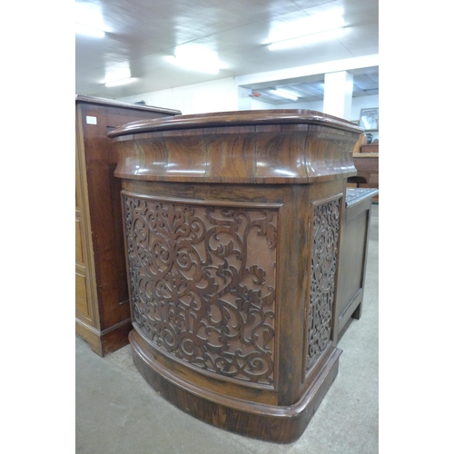 165 - An early Victorian rosewood fretwork Davenport desk, manufactured by J. Manuel, Sheffield