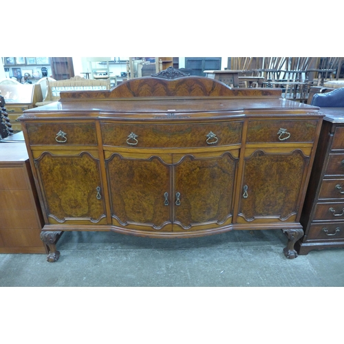 166 - An early 20th Century burr walnut bow front sideboard