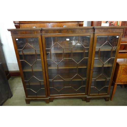 169 - An Edward VII mahogany astragal glazed three door bookcase